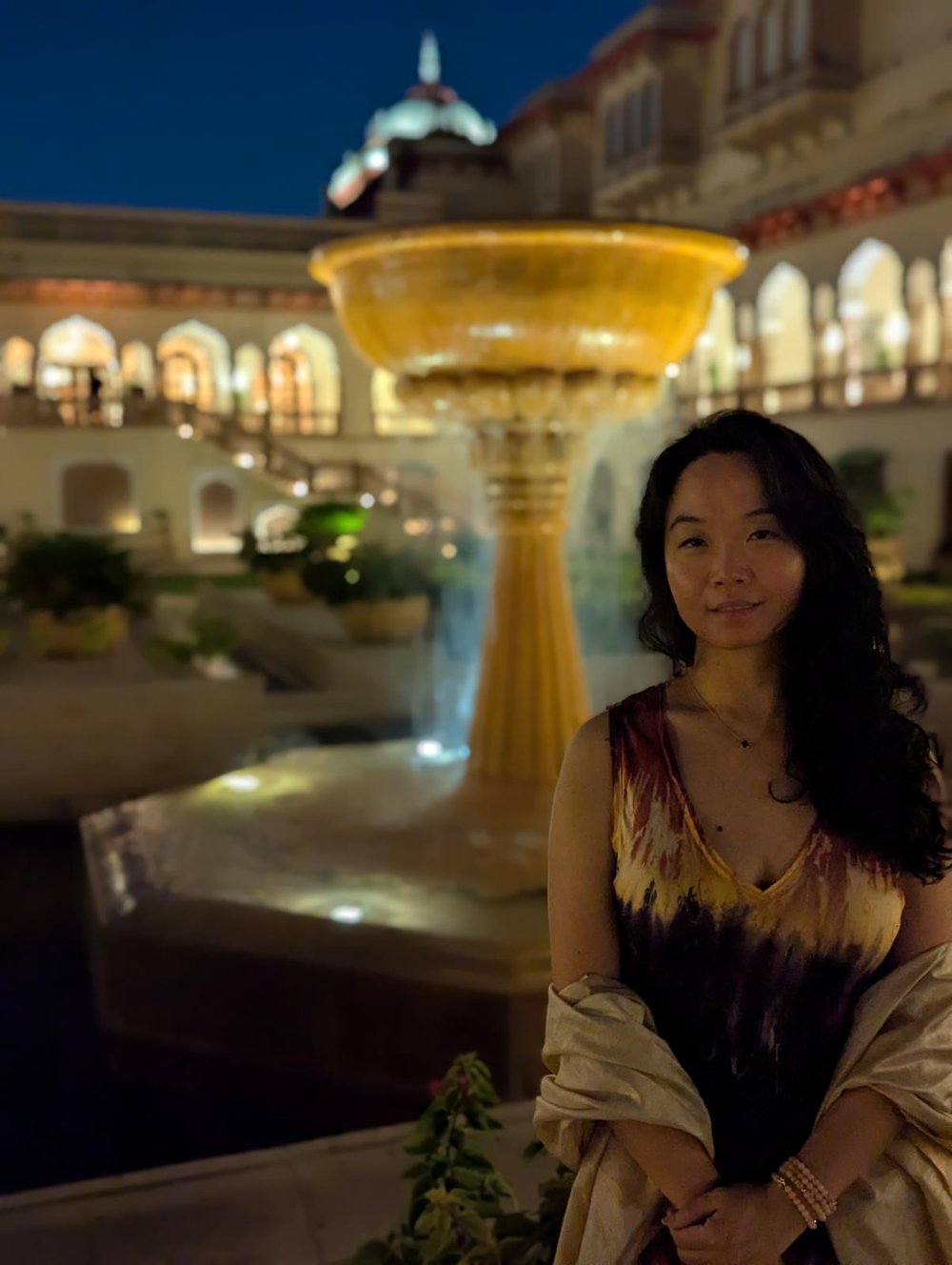Sarah Xie in an evening courtyard